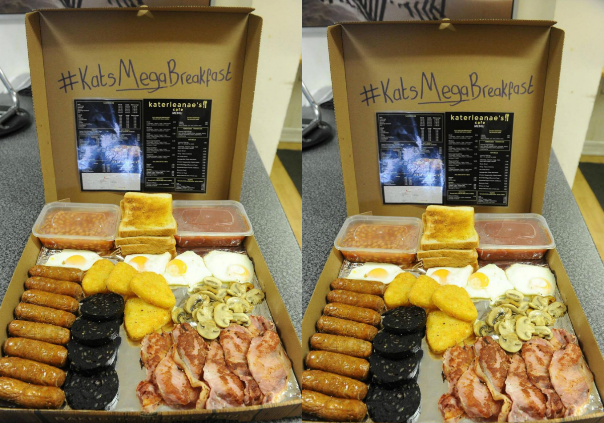 Buitensporig ontbijt wordt geserveerd in pizzadoos