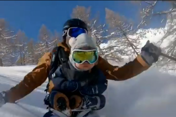 VIDEO. Stuntskiër maakt rit met zoontje buiten de skipiste