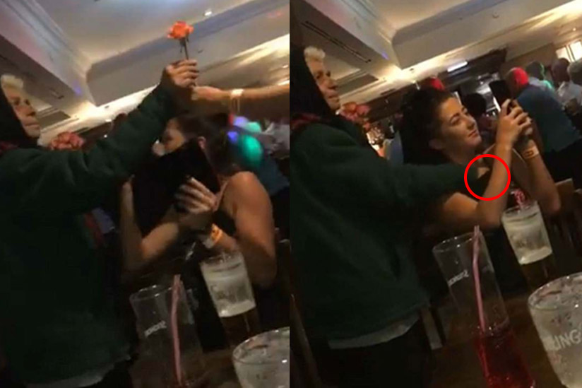 ‘Bloemenverkoopster’ schuift hand in boezem van nietsvermoedende dame. Maar waarom? (video)