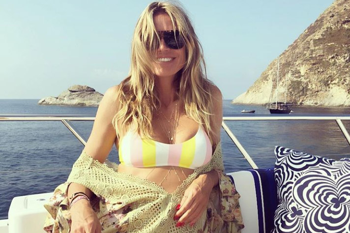 Heidi Klum schittert in ‘stoute’ fotoshoot: “Heidi, jij heet beest” (foto’s)