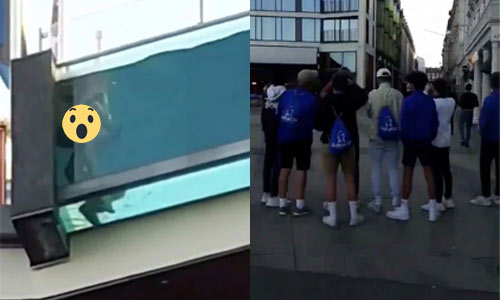 Vrijend koppeltje heeft niet door dat zwembad op dak van hotel DOORZICHTIG is (video)