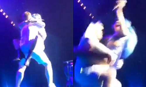 AUCH: Dolle fan pakt Lady Gaga op, maar dan vallen ze samen LOEIHARD van podium (video)