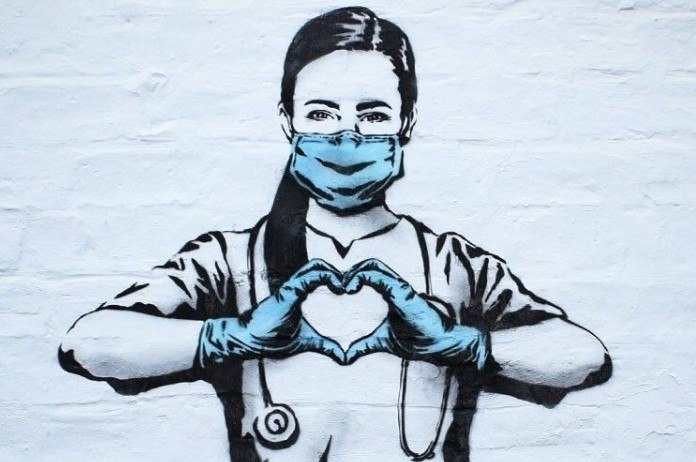 IN BEELD. Hoopgevende coronagraffiti siert de Schotse straten in Glasgow