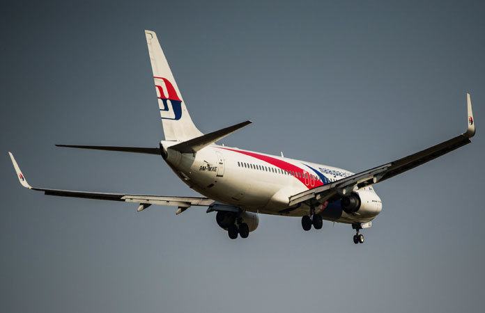 Visser spot brokstuk van vliegtuig op strand. Is het van MH370? (foto’s)