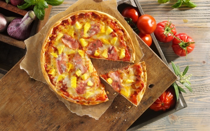Stopt Domino’s echt met ananas op pizza te leggen?
