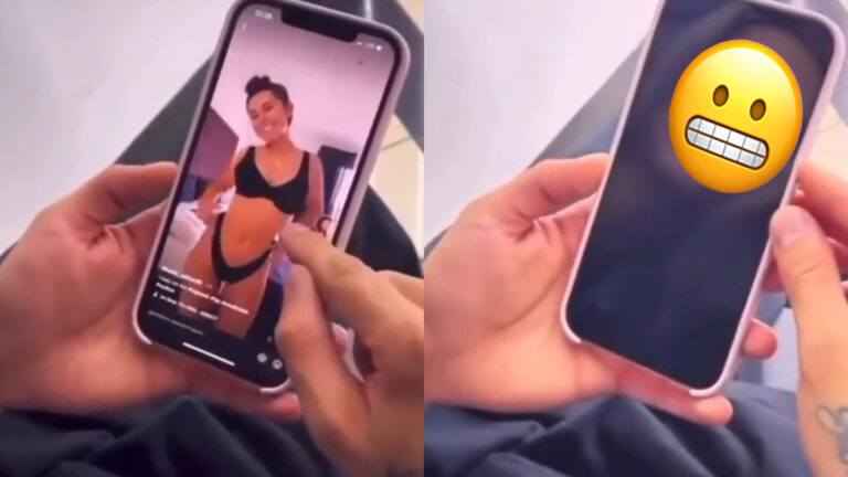 Man kijkt stiekem naar mooie dames op zijn smartphone. Maar dan? BETRAPT! (video)