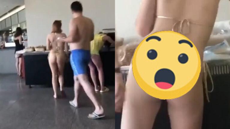 Door haar pikante tattoo weet iedereen aan de buffettafel wat dame in bikini leuk vindt in bed (video)