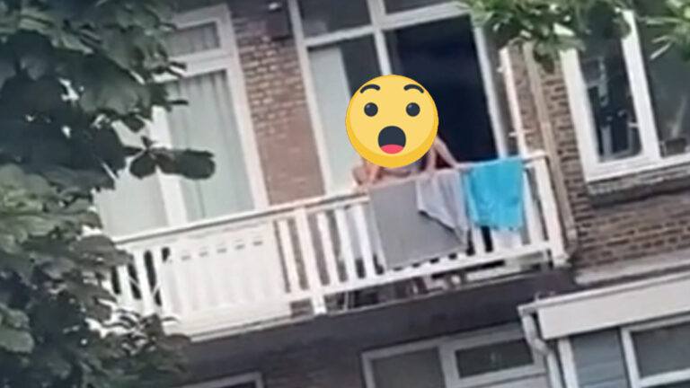 Vrijend koppeltje op balkon geeft buren een ‘gratis show’: “Op klaarlichte dag!” (video)