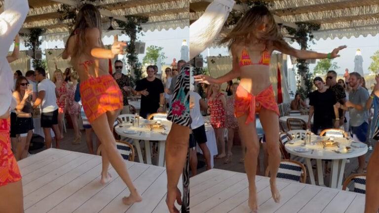 Dame in bikini oogst lof met spontaan dansje op tafel: “Pure levensvreugde!” (video)