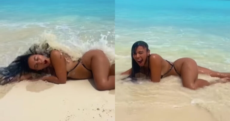 Dame in bikini wil sensueel poseren op het strand. Maar dan? KLETSNAT! (video’s)