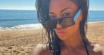 Nicole Scherzinger amuseert zich in bikini op het strand: “Je ziet er prachtig uit!” (foto’s)