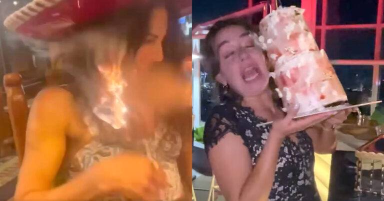 Jarige dame met lang haar wil kaarsjes uitblazen. Maar dat gaat STEVIG fout! (fails)