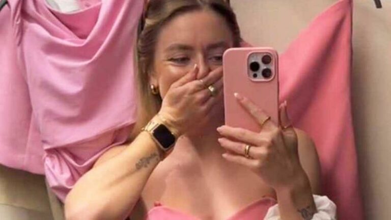 Influencer past elegant topje, maar haar boezem wordt niet genoeg bedekt: “Ik ga stuk van het lachen!” (video)