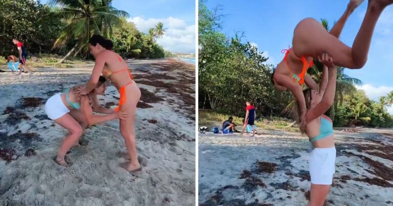 Dames doen acrobatisch hoogstandje op strand, maar dat gaat pijnlijk mis: “Dit had veel erger kunnen aflopen!” (video)