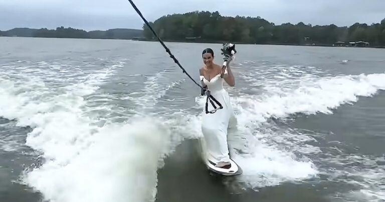 Kersverse bruid waagt zich in trouwkleed aan wakesurfen: “Zo getalenteerd!” (video)